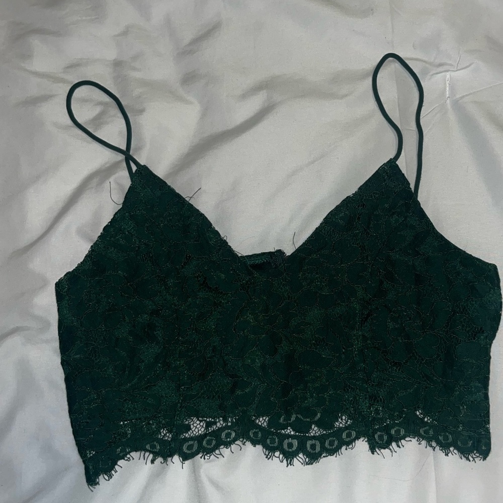 Dark green lace crop top. Back has a gold zipper in the middle.